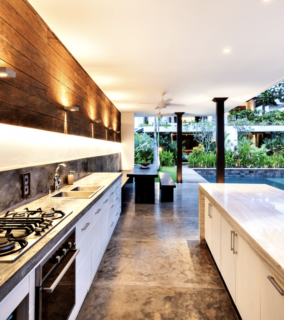 outdoor kitchen with marble flooring, modern kitchen fixtures, new countertop and cabinets